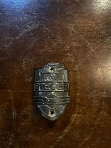 Antiga plaqueta original Sieger