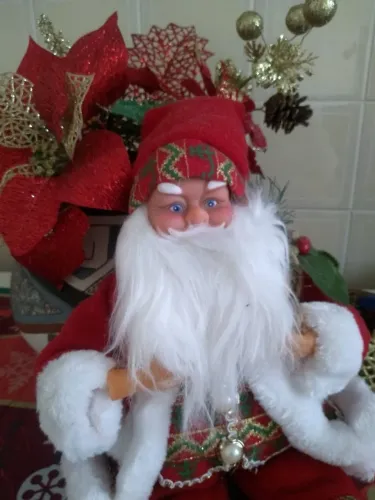 Papai Noel sentado para decoração Natalina.