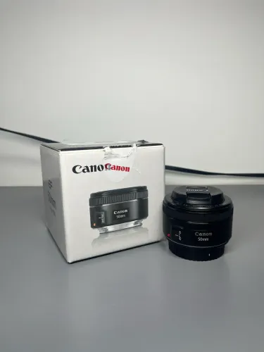 Canon EOS Rebel T5i + 18-55mm STM + 50mm f/1.8 STM + Bolsa Canon