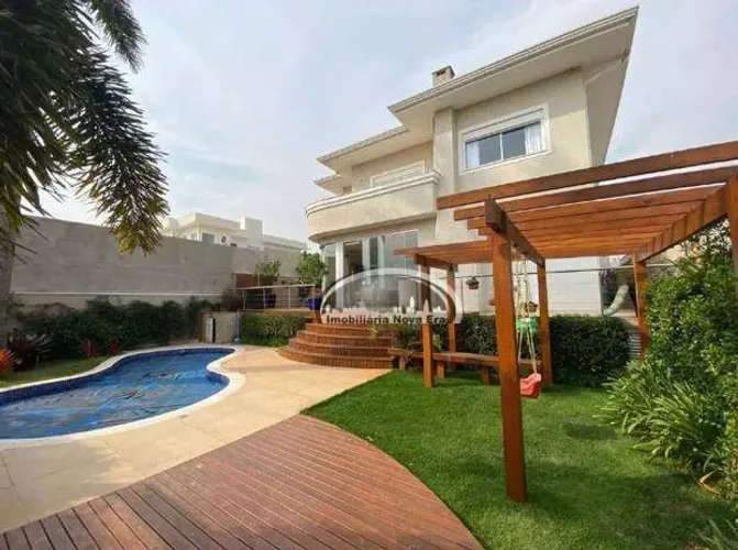 Casa com 3 dormitórios para alugar, 443 m² por R$ 16.621,41/mês - Condomínio Terras de Vin