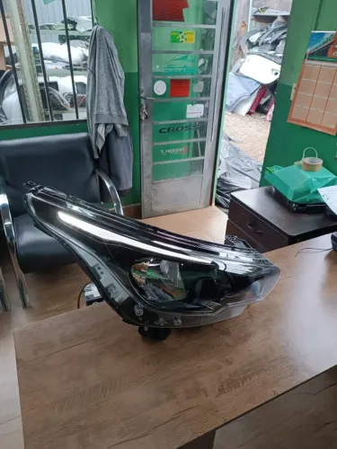 Farol direito Argo Cronos com Led original sem conserto