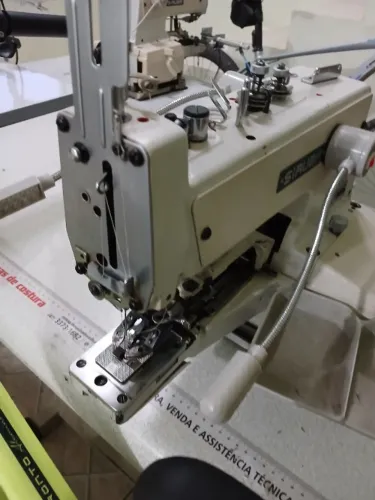 Maquina de botão