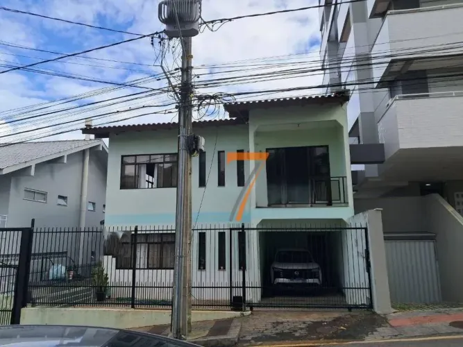 Casa com 6 dormitórios, 200 m² - venda por R$ 1.380.000,00 ou aluguel por R$ 9.601,37/mês