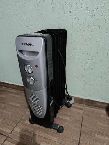 Aquecedor portátil a óleo mondial 1500w 110v