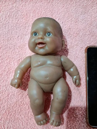 Boneco bebe em vinil afro descendente
