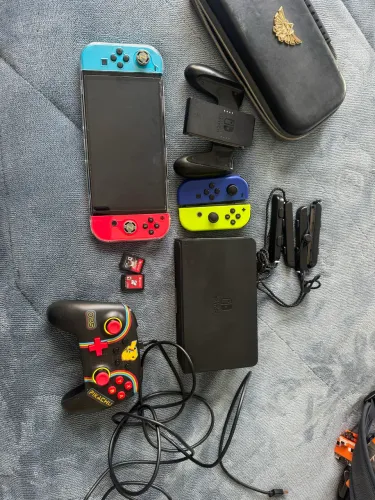 Nintendo switch oled com jogos e acessórios