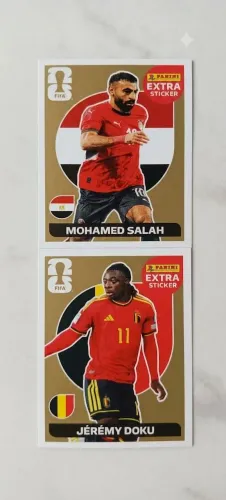 2 Figurinhas Extra Gold Copa 2026 - Salah + Doku